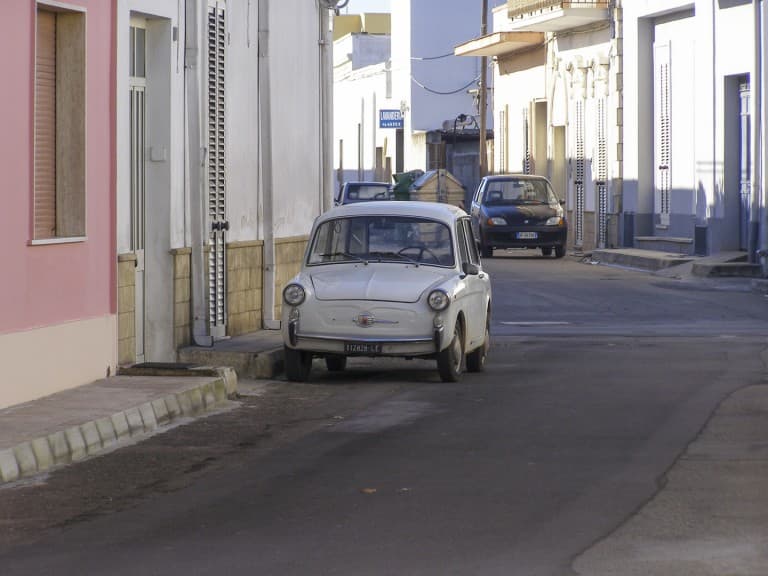 Old “Autobianchi Bianchina” parked on the street of Veglie town in Puglia