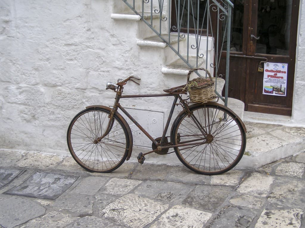 The bike parked on a street in Ostuni