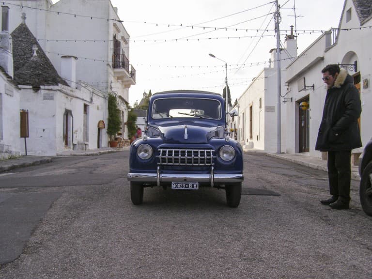 An old Italian car on the road at Ostuni in Puglia