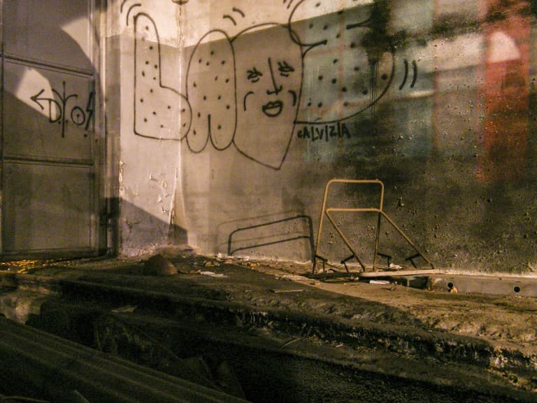 Graffiti at the Abandoned Train Repairing Workshop in Turin, Italy