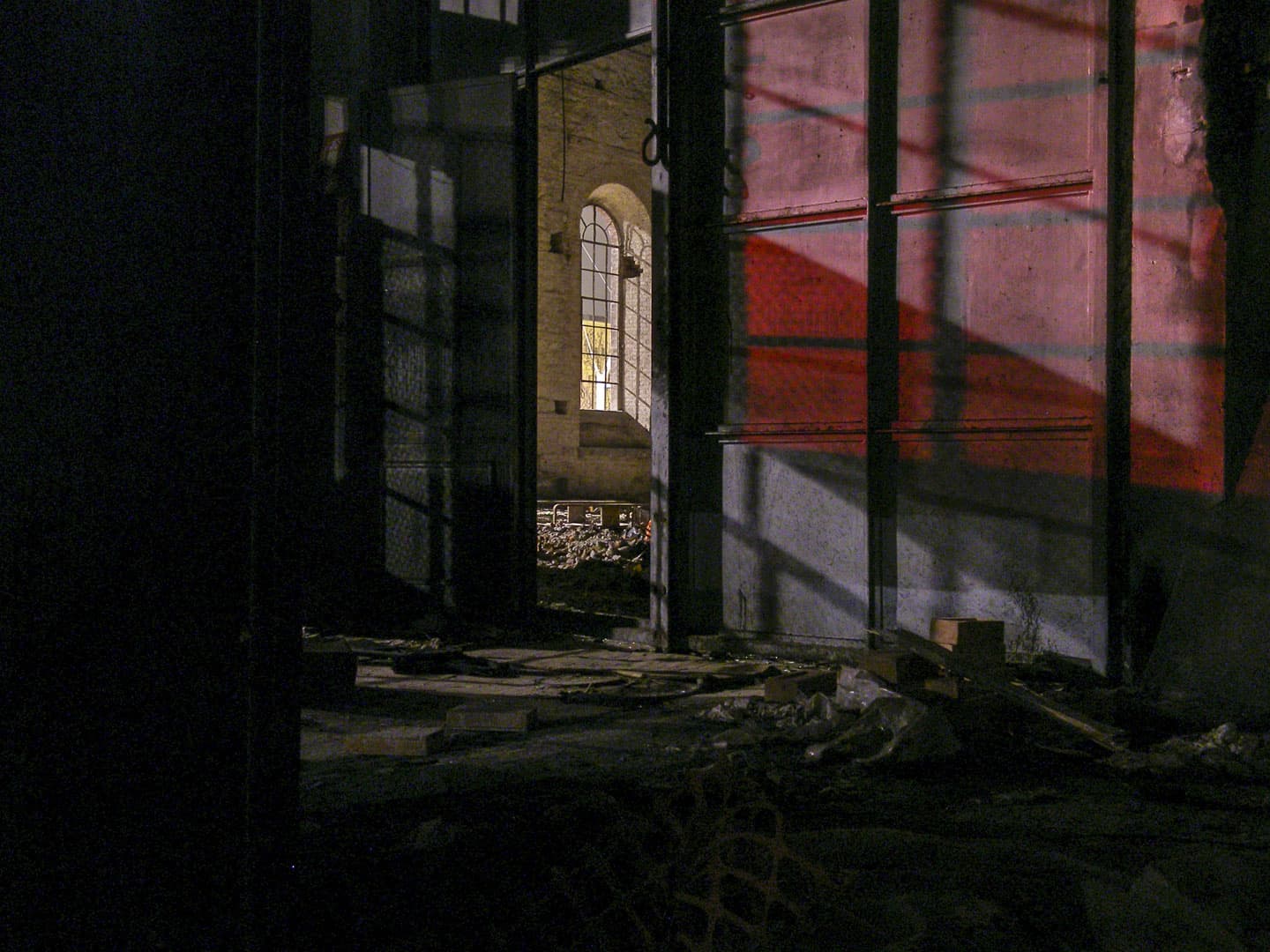 Window of the Abandoned Train Repairing Workshop in Turin, Italy