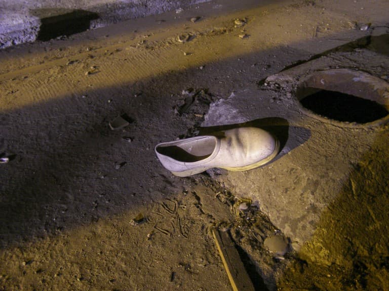 A Lost Shoe at the Abandoned Train Repairing Workshop in Turin, Italy
