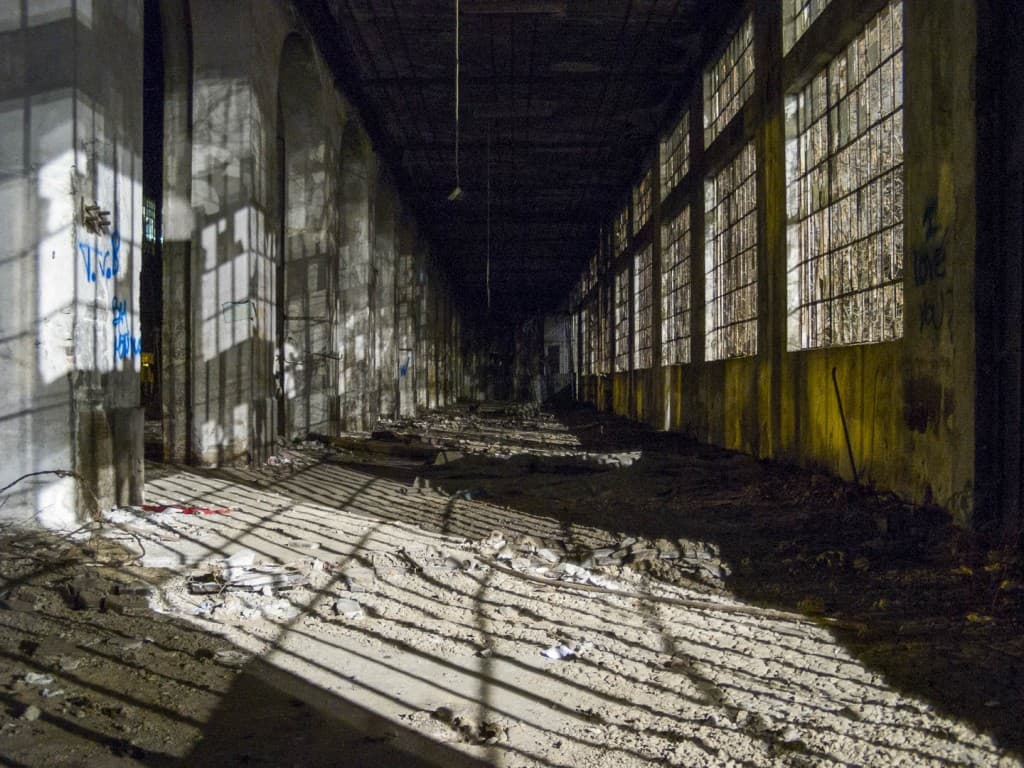 Shadow Cage at the Abandoned Train Repairing Workshop in Turin, Italy