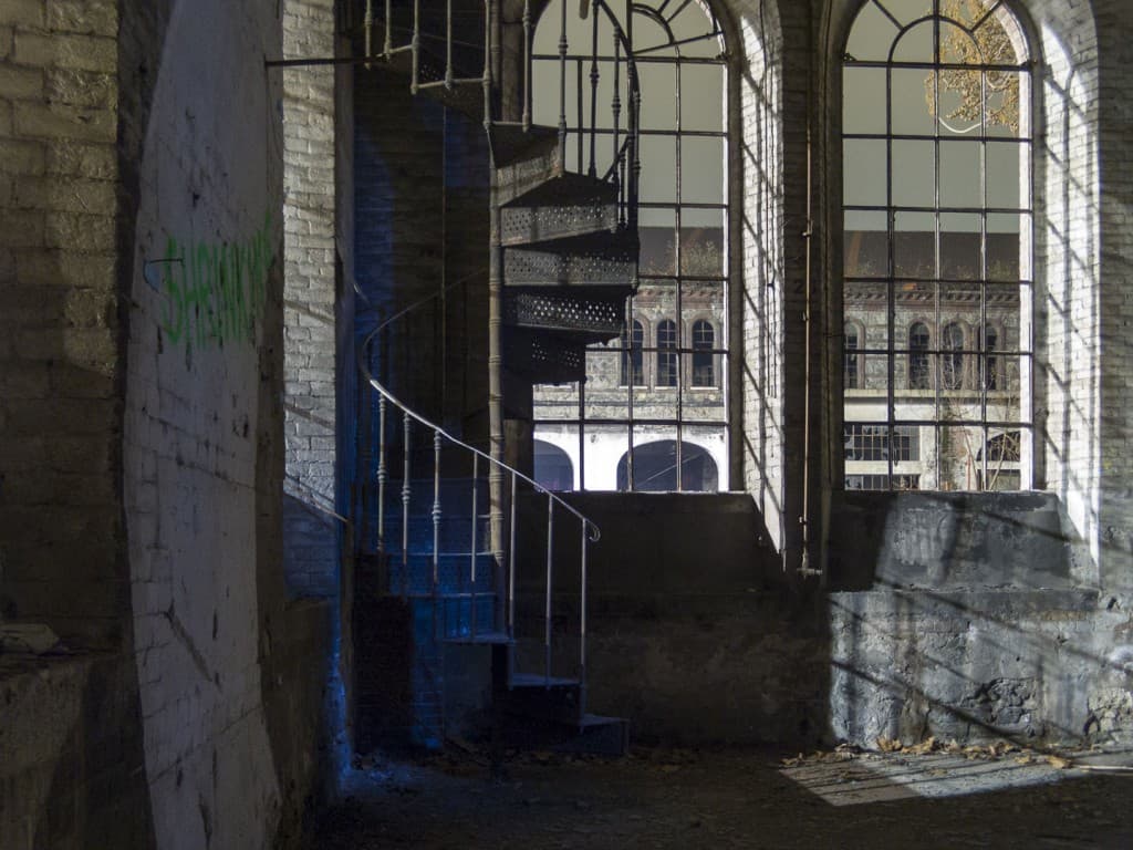 Spiral Staircase at the Abandoned Train Repairing Workshop in Turin, Italy