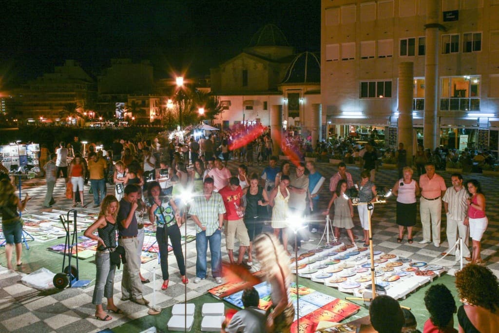 Benidorm (Alicante) – Spain, People Watching the Artists by Night