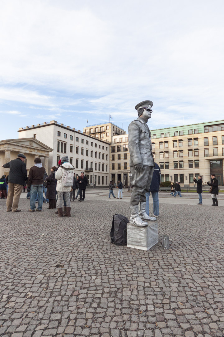 Street Performer Standing at the Brandenburg Gate in Berlin – Germany