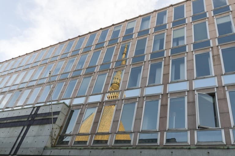 Mole Antonelliana reflection on RAI building – Turin, Italy